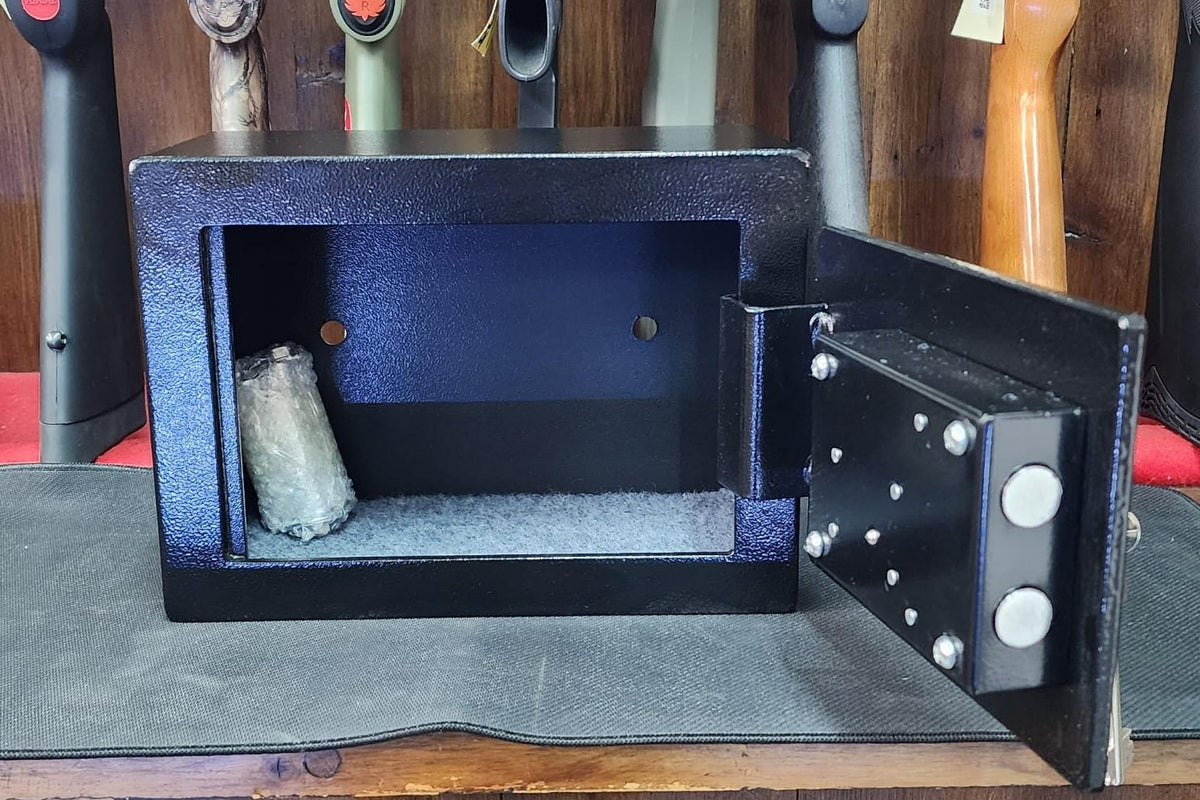 Buffalo River Platinum pistol and ammo safe with door open at an angle